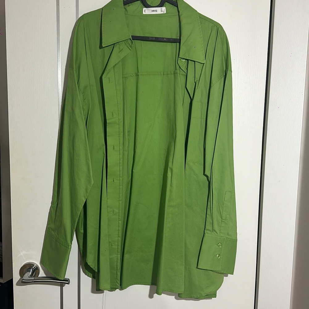 Green button up shirt